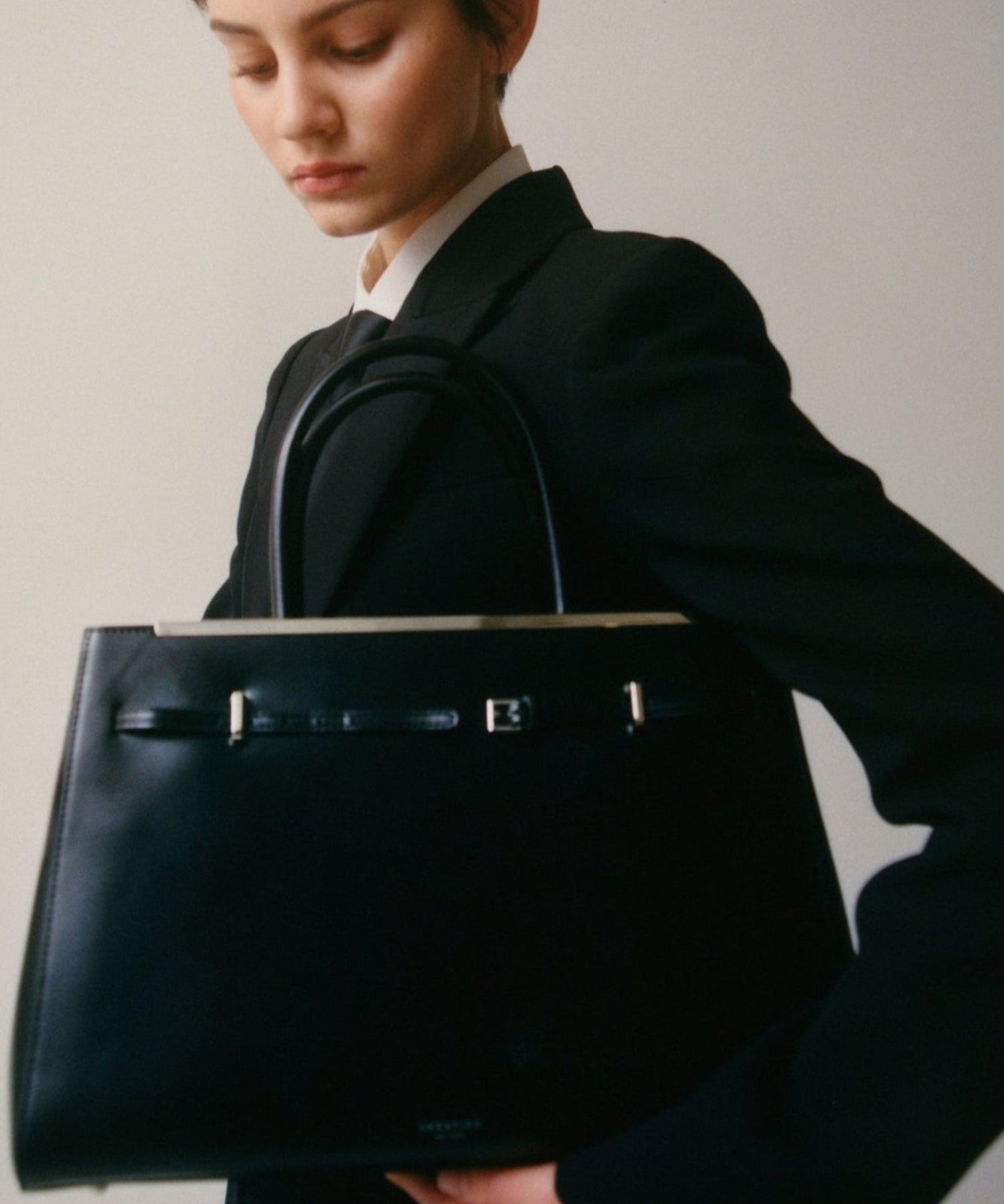 Noir Leather Book Tote Bag 33 for Work with a model