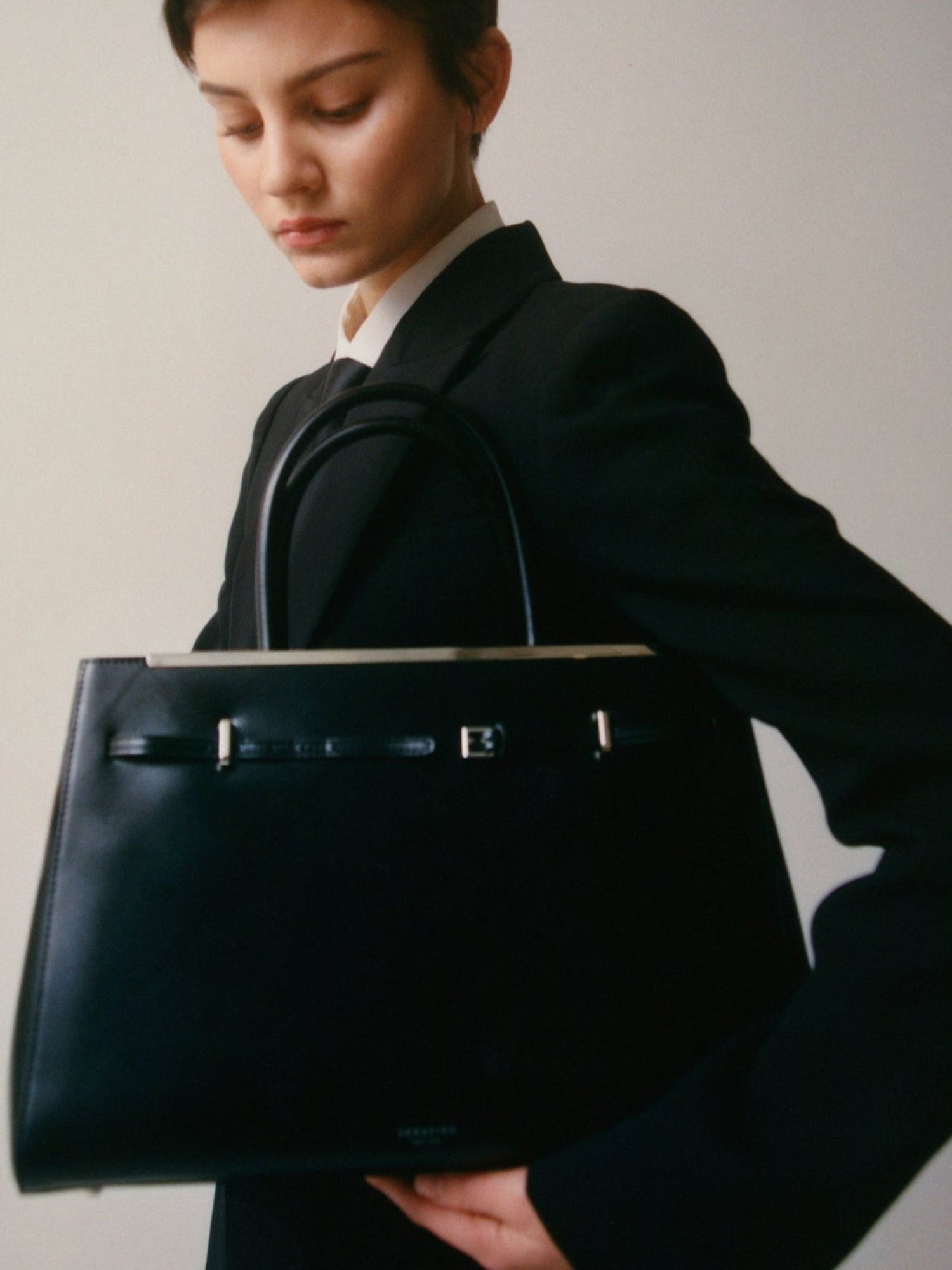 Noir Leather Book Tote Bag 33 for Work with a model