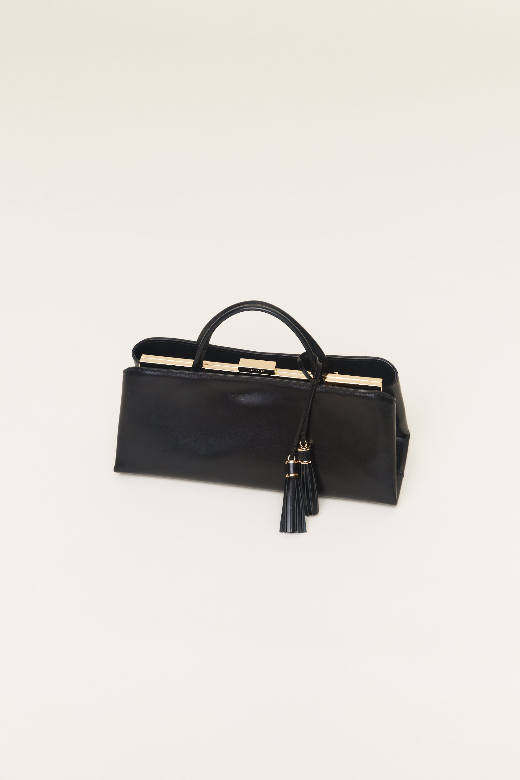Gold Noir Tassel Charm