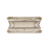 Silver Ivory Éclair Bag: White Clutch Handbag with silver accents on a white background