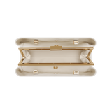 Gold Ivory Éclair Bag: White Clutch Handbag with gold accents on a white background