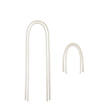 Pair of white arch-shaped earrings on a white background
