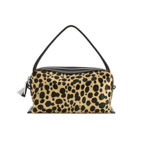 Leopard print Verafied New York Cheetah Calf Hair Café Mini Handbag with black handle on a white background