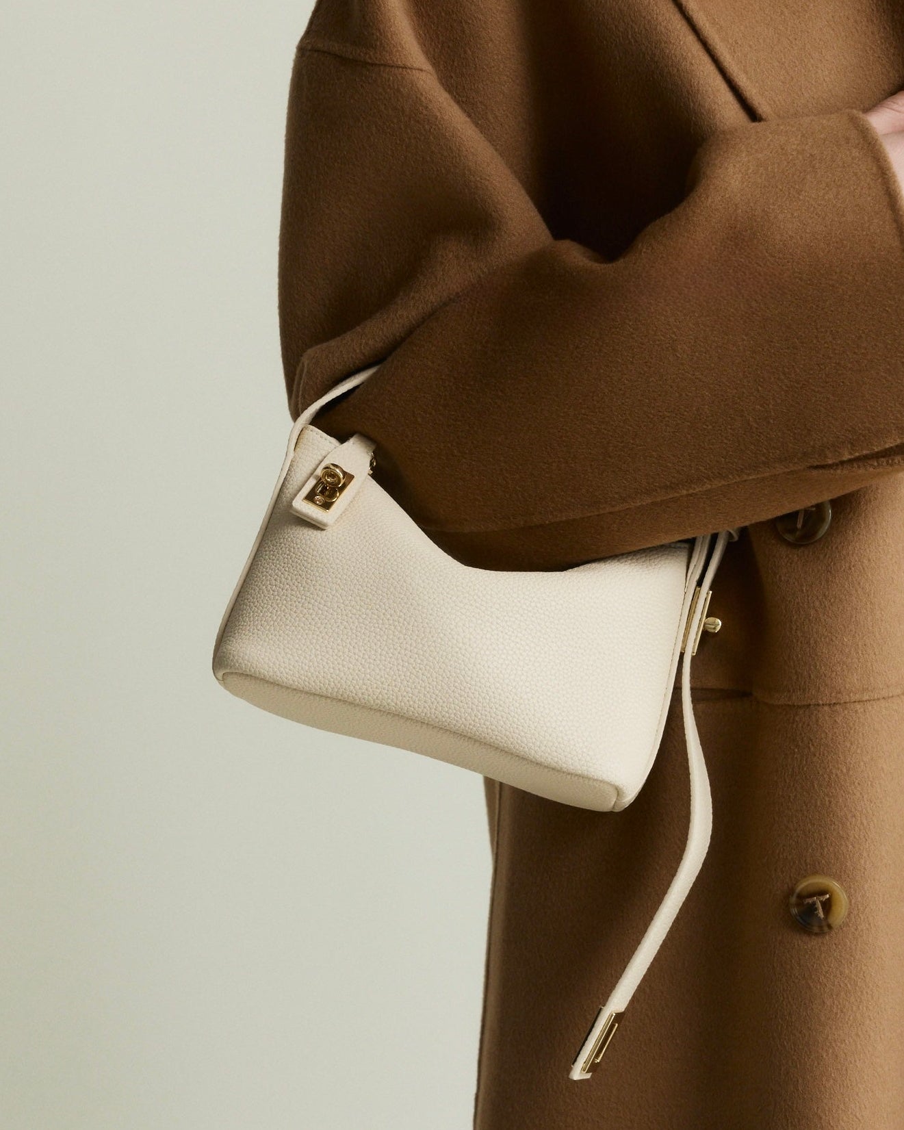 Ivory Twister Hobo Handbag - Verafied New York