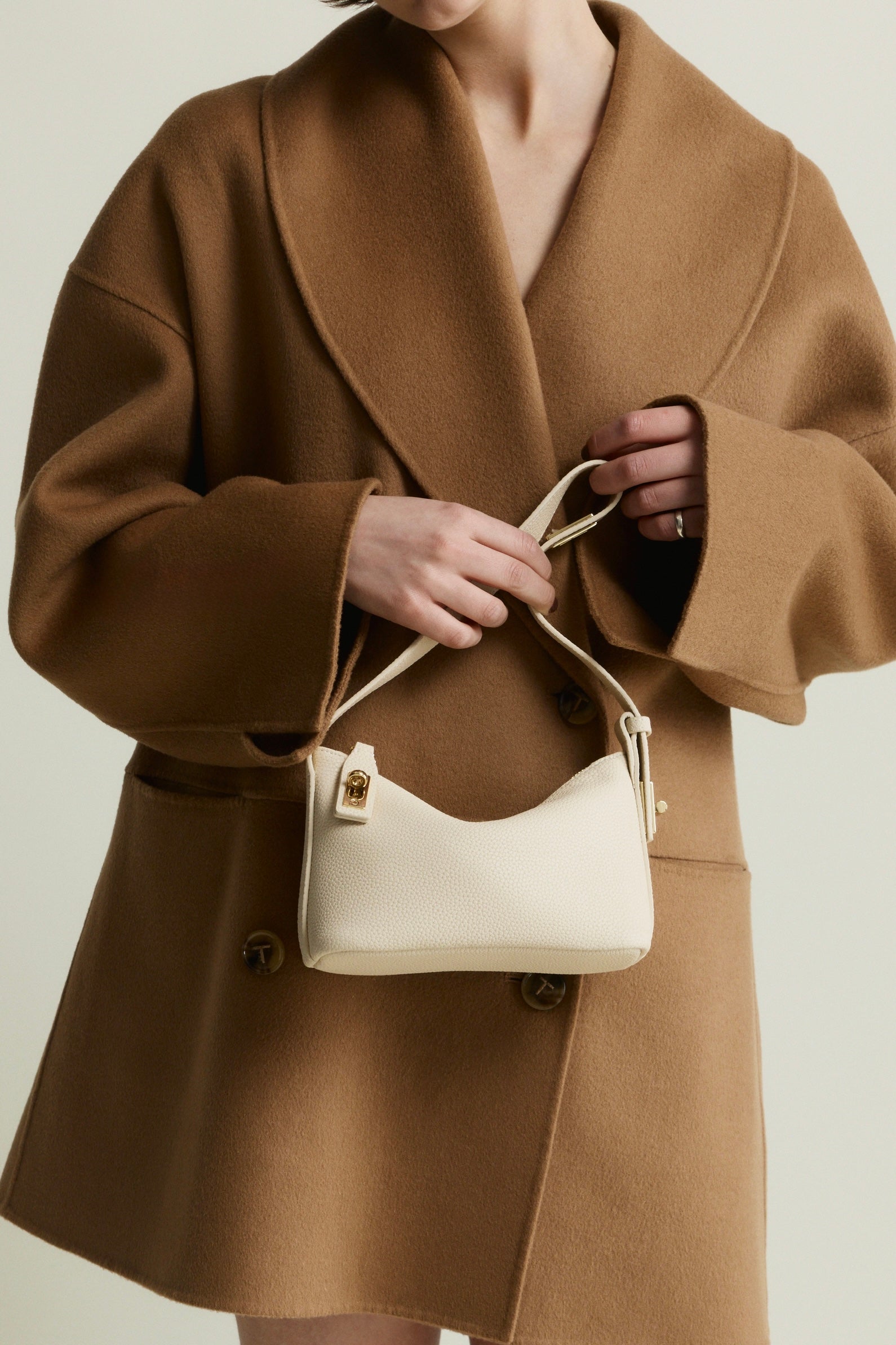 Ivory Twister Hobo Bag