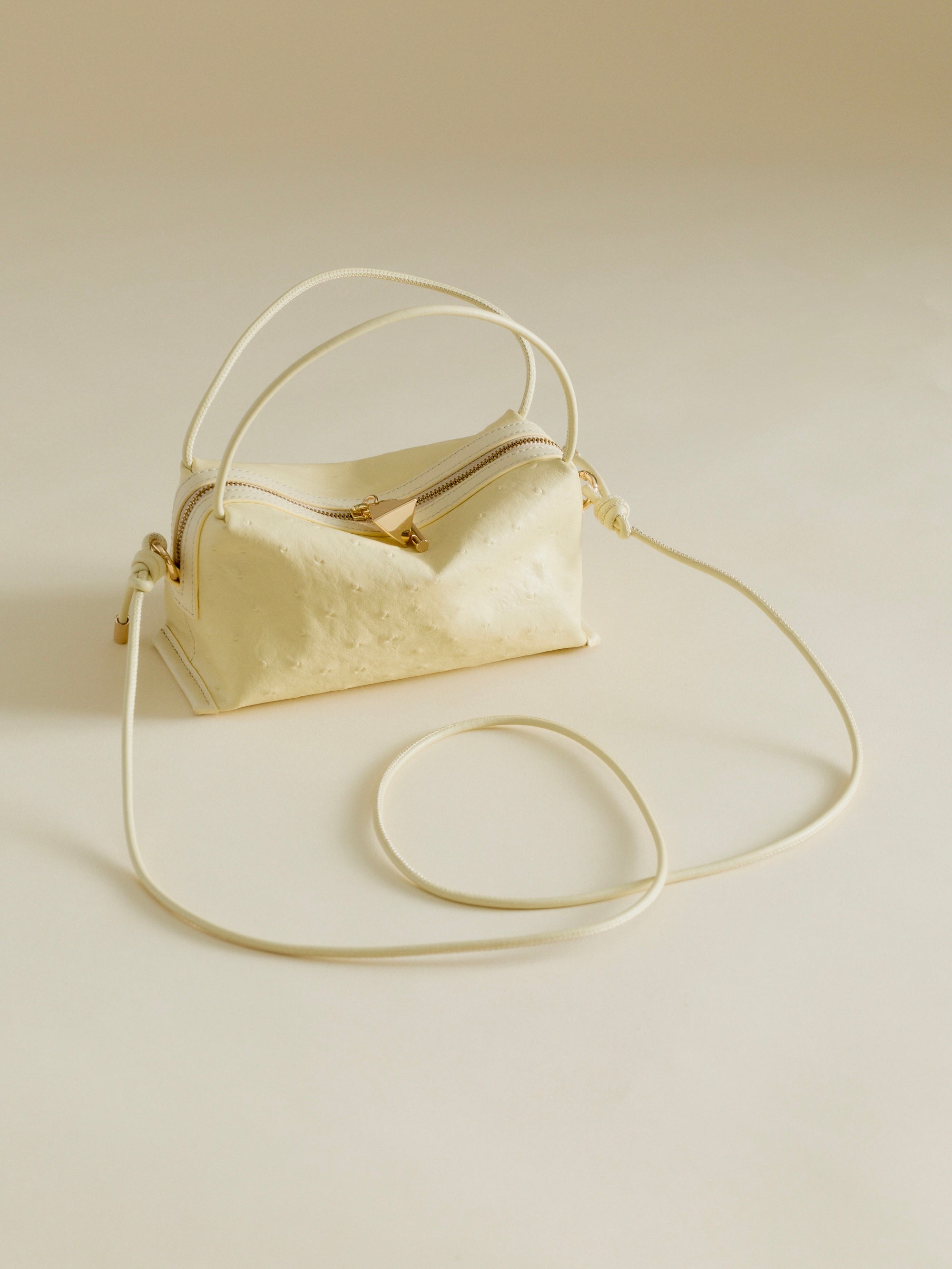 Butter Ostrich Café Mini Bag: Crossbody Handbag - Verafied New York