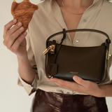 Mini Gold Chocolate Hobo Shoulder Handbag with a model