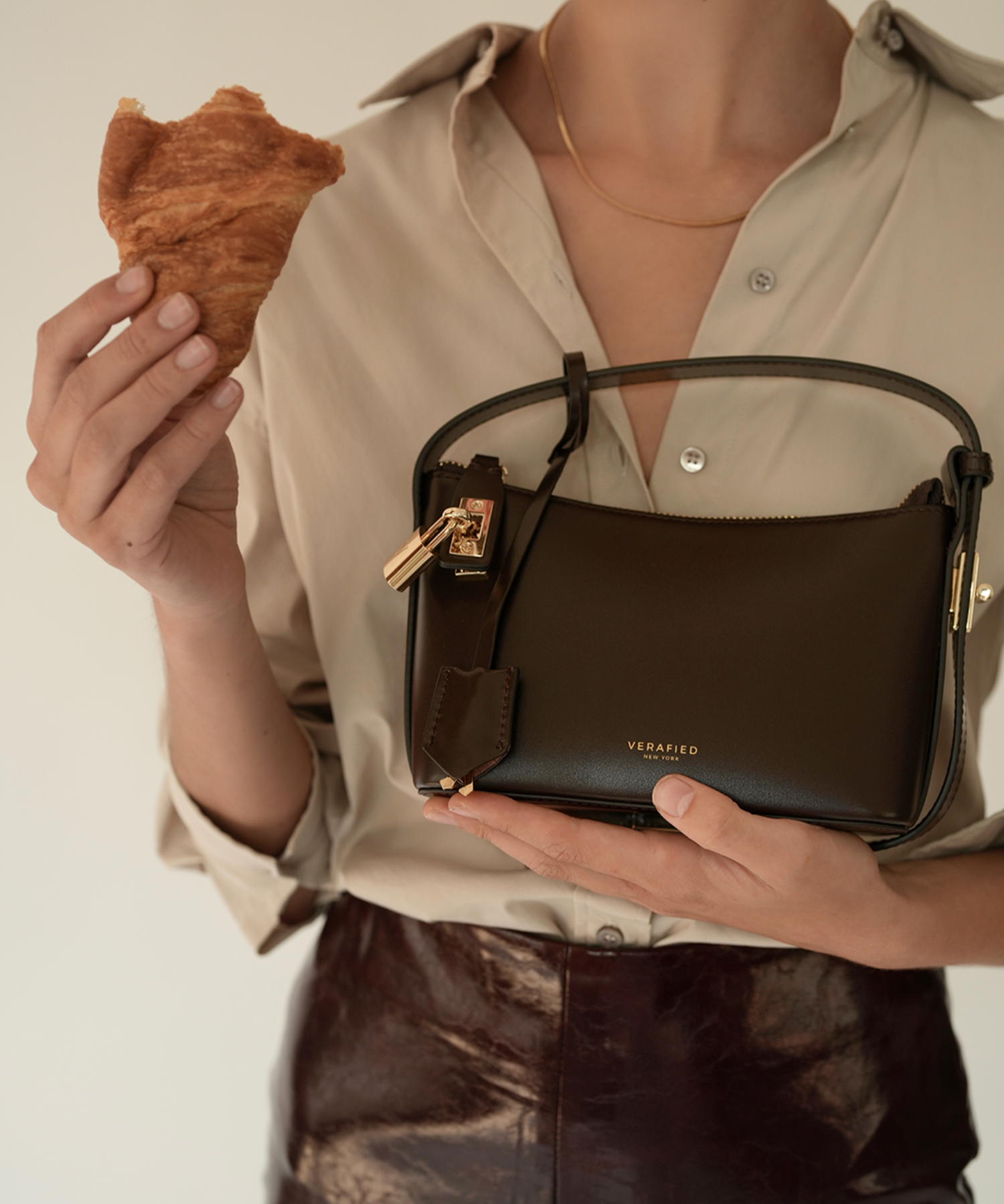 Mini Gold Chocolate Hobo Shoulder Handbag with a model