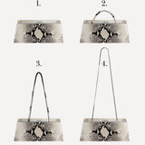 Four handbags with snake print on a white background